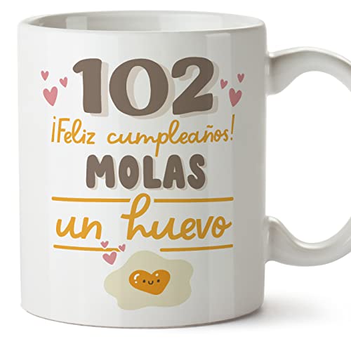 MUGFFINS Tazas 102 Cumpleaños - En Español - Feliz Cumpleaños Molas un Huevo - 11 oz / 330 ml - Regalo original y divertido