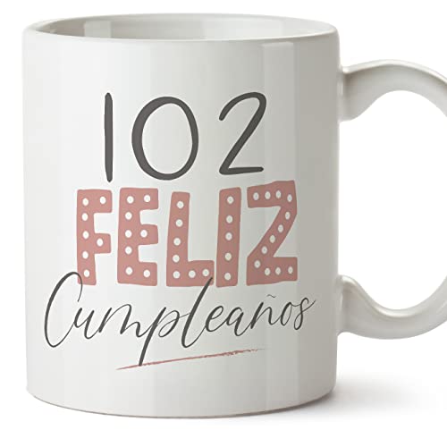 MUGFFINS Tazas 102 Cumpleaños - En Español - ¡Feliz Cumpleaños! Rosa - 11 oz / 330 ml - Regalo original y divertido