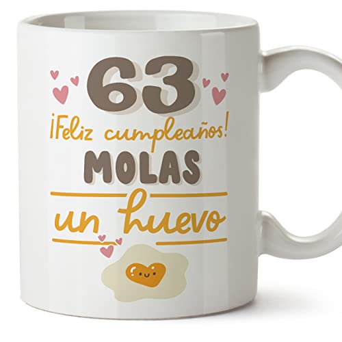 MUGFFINS Tazas 63 Cumpleaños - En Español - Feliz Cumpleaños Molas un Huevo - 11 oz / 330 ml - Regalo original y divertido